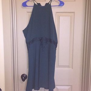 Cute dark green dress with see through lace detail